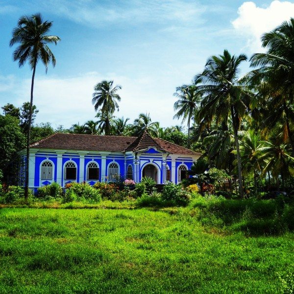An old Portuguese house amidst greenery during monsoons in Goa